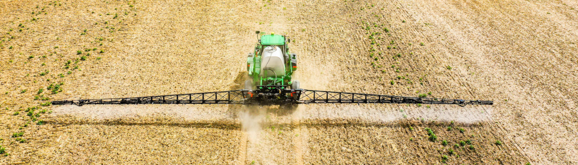 Sprayer putting down crop nutrients